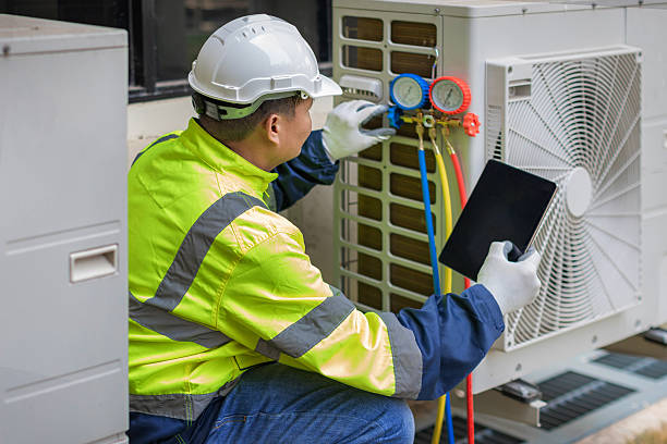 Professional Heat Pump Repair technician working in Hillsborough, CA